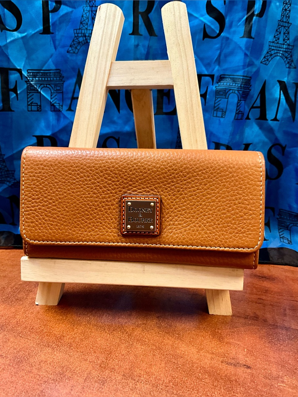 Dooney & Bourke Cognac Pebbled Leather Continental Wallet with Gold Plaque